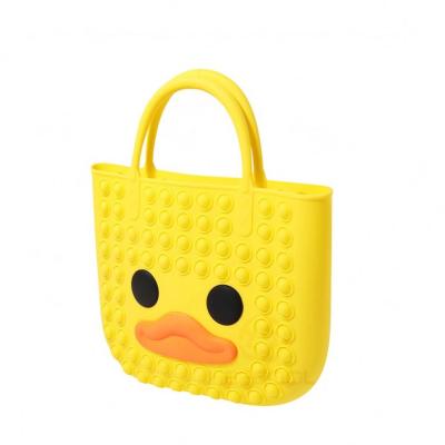 China 2021 Hot Selling Amazon Silicone Handbag Yellow Duck Gift Bubble Bag For Kids Adults for sale