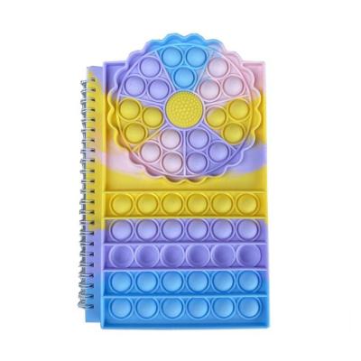 China Amazon Hot Sale 40 Pages Softcover Sunflower Design Silicone Pop Cover A5 Notebook Stir Sensory Toys Pop Bubbles Pop Notebook for sale