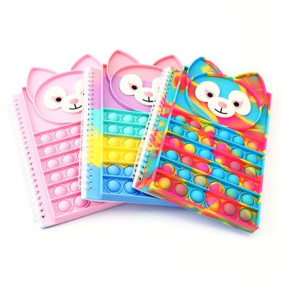 China Amazon hot sale silicone pop book cover spiral notebook stir sensory toys push bubbles A5 40 pages pop up notebook for sale