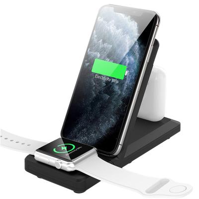 China Earphone Wholesale Latest 3 in 1 Mobile Phone Holder Stand Fast Qi Wireless Charger for sale