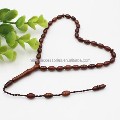 China China OEM ODM Daily Jewelry Religious Handmade Muslim Prayer Strand 33 Beads 5*8MM Oval Ball Kuka Nut Tasbih In Bracelet for sale