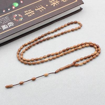 China Good Supply Muslim Gelang Brown KukaTasbih Religious Kokka Rosaries Islamic Prayer Beads 99 Natural Islamic Prayer Beads Oval Beads 5*8MM for sale