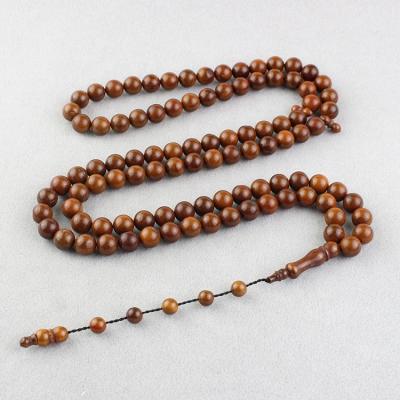 China Good Factory Price Religious Muslim Tesbih Tasbih Brown 10MM Black Religious Rosary Bracelet 99 Beads Round Kuka Islamic Prayer Beads for sale