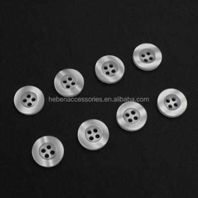 China Viable In Stock New Design Clothes Jeans Charm Button Rim Round Wide 4 Hole Fancy Pearl Resin Clear White Buttons For Garment Shirt for sale