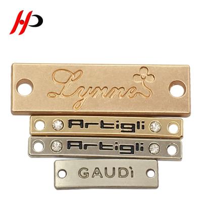 China Custom White Color Zinc Alloy Metal Logo Label Viable For Apparel for sale