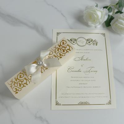 China Europe hot sale cheap roll wedding invitation with laser cut hollow paper box and ribbon bow roll invites for sale