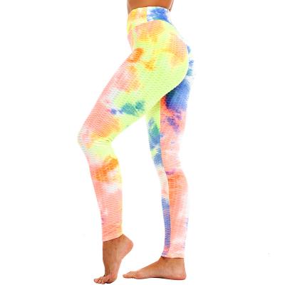 China Popular breathable ink jacquard pants tie-dyed bubble pants slimming body lift butt exercise fitness yoga pants logo for sale