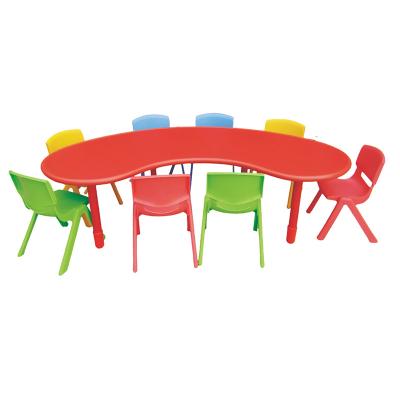 China Modern production of kindergarten plastic children's candy color family desks and chairs for sale