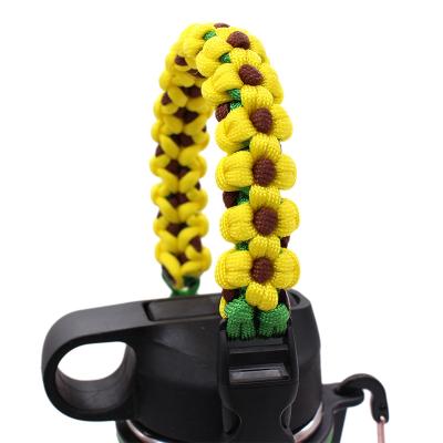 China Outdoor Camping Hiking Paracord Carrier Water Bottle Handle Strap Moving Rope With Carabiner for sale