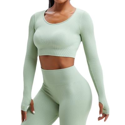 China 2021 Seamless Breathable Sportswear Yarn Yoga Long Sleeved Long Sleeve Tops Tight Fit Short Blouses For Female Sexy Yoga Clothing Tops for sale