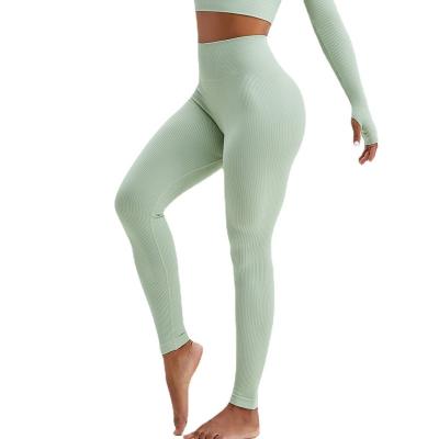 China Breathable Seamless Well-Fitting Yoga Peach Hip Waist Yoga Legging Pants High For New Fashionable Female Yarn Seamless Snakeskin Legging for sale