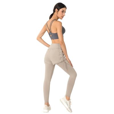 China 2021 High Waist Women Yoga Breathable Sexy Working External Gaiters Solid Color Wholesale Two Piece Breathable Sweatpants For Female for sale