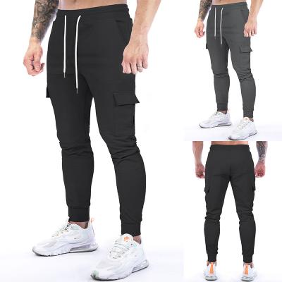 China Sports Breathable Outdoor Casual Sweatpants With Multi Pocket Sportswear For Men Elastic Waist Loose Style Mens Jogging Pants for sale