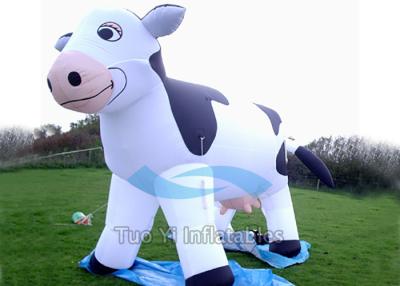 China Waterproof Dairy Cow Blow Up Cartoon Characters Inflatable With Air Blower for sale