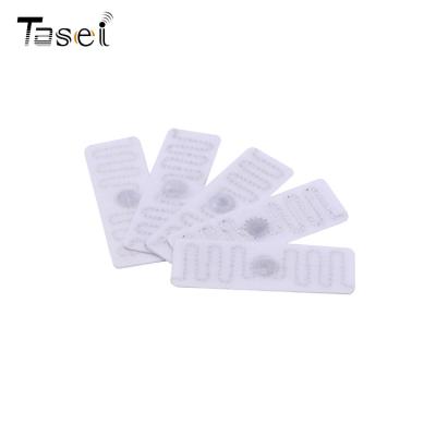 China Flexible Rfid Laundry Tag UHF RFID Textile Bottom Laundry Tag for sale