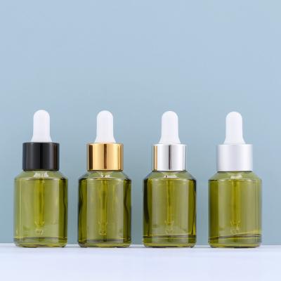 China Xinhe 5ml 10ml 15ml 20ml 30ml Skin Care Essential Oil Serum Dropper Bottle Good Quality Glass Bottle With Custom Colors for sale