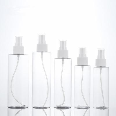 China Xinhe Cosmetic Shoulder Clear Flat PET Bottle Clear White Spray Bottle for sale