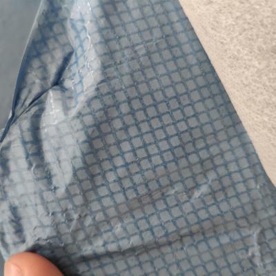 China 56gsm SF Waterproof Blue Microporous Breathable Film PP Spunbond Compound Special Pattern Nonwoven for sale