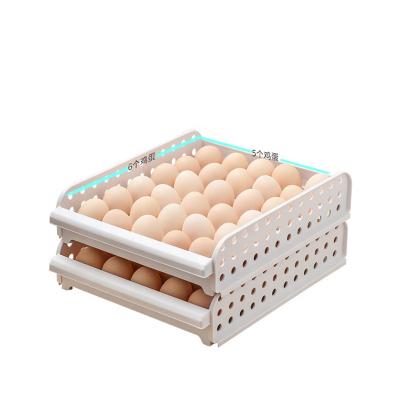 China Food grade stackable plastic egg storage rack container refrigerator egg storage tray 30 grid stackable storage eggs holder rack à venda