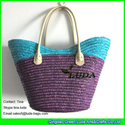 China LUDA handmade beach handbags striped fashion wheat straw bag en venta