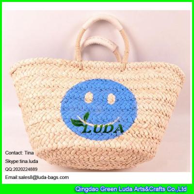 China LUDA high quality lady shoper bag handmade smile face cornhusk straw shopping bag for sale