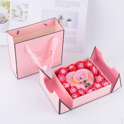 China Recycled Materials Rose Flower Boxes Packaging With Ribbon Rose Mom Gift Box Around Square Flower Boxes for sale