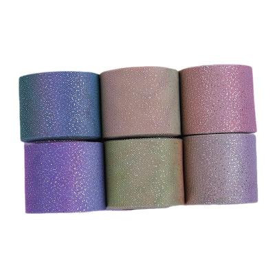 China Floral Tulle Fabric Ribbons Rolls 10cmX25 Yard/Roll Dusting Powder Rainbow Gradient Color Fabric Glitter Yarn Roll for sale