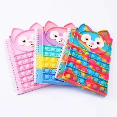 China FN1016 Funny Educational Toy Wholesale Student Cute Push Bubble Fidget Toy Note Book A5 Notebook Silicone Cover Notepad Business Planner Notebook for sale