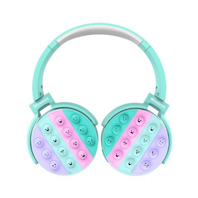 China Smile Wireless Silicone Headset Bubble Earphone Toy FN1009 Push Earphone Stereo Moving Person Toy for sale