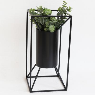 China 100% Handmade Indoor Decor Black Top Floor Table Metal Smart Home Style Modern Metal Flower Pots for sale