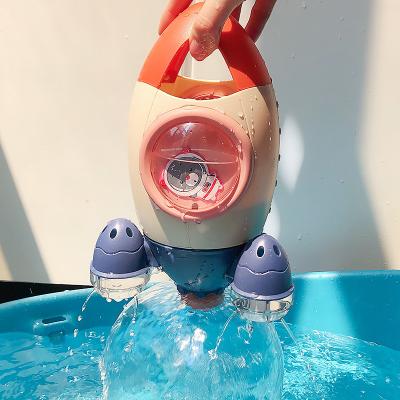 China ABS Rotating Water Spray Rocket Shape Bathroom Play Bath Toys for sale