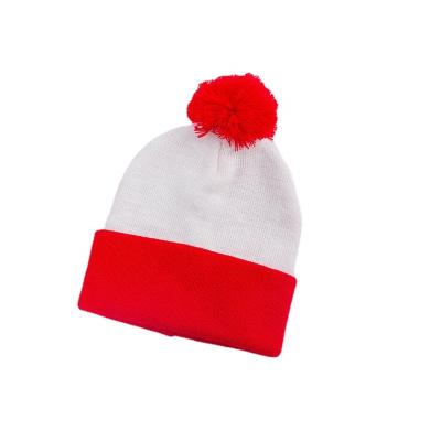 China Double Color Hot Selling COMMON Large Pom Pom Jacquard Knitted Beanie For Cold Winter for sale