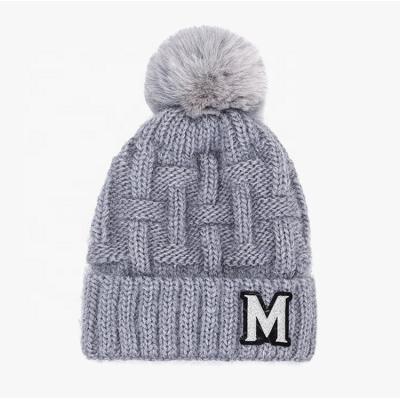 China Fashion Winter Leisure Wool Beanie Hat Warm Knitted Beanie COMMON Hat With Pom Pom For Women for sale