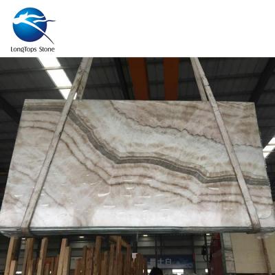 China Gorgeous interior decorative serpeggiante white onyx marble floor and wall slab interior for sale