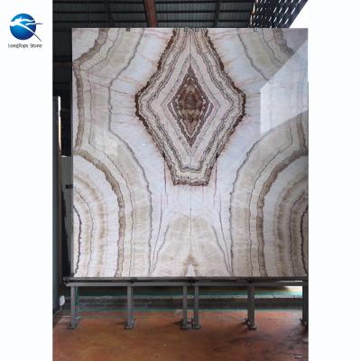 China Interior decoration Xiamen Longtops exotic bookmatched onyx backlit red marble slab for sale