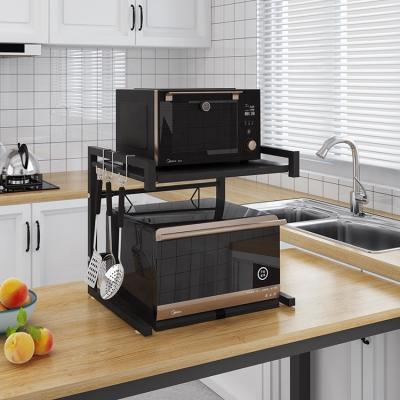 中国 Wholesale Multifunctional Metal Retractable Double-Layer Metal Oven Stand Retractable Kitchen Microwave Oven Rack 販売のため