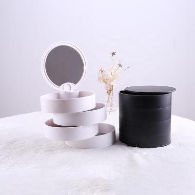 China Viable Rotating Cosmetic Storage Carousel Makeup Organizer 360 Degree Stand Holder Rotating Brush Holder With Makeup Mirror for sale