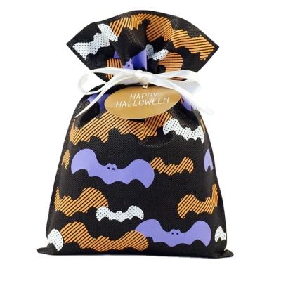 China Halloween Party Favor Nonwoven Fabric 75gsm Pockets Cartoon Bat Pattern Drawstring Ribbon Black Gift Bag for sale