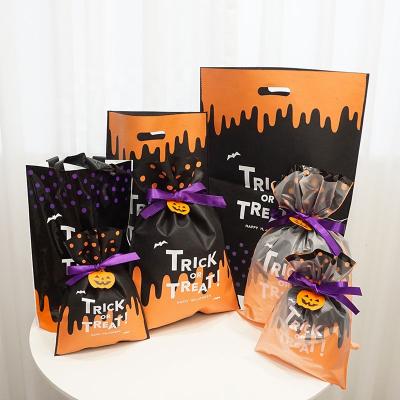 China Party Decoration Package Pouches Gift Wrap Moisture Proof Nonwoven Plastic Drawstring Wrapping Halloween Favor Bags for sale