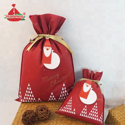 China Huadefeng Christmas Drawstring Santa Bag Custom Japan Style BIODEGRADABLE Nonwoven Selection for sale