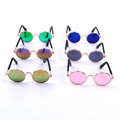 China Viable Wholesale Cool Photo Props Funny Cute Pet Cat Eye Sunglasses Dog Glasses Pet Accessories for sale