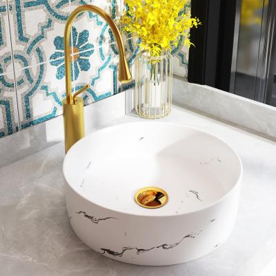 China Luxury White Marble Round Countertop Bathroom Sink Ceramic Vessel Sink for sale