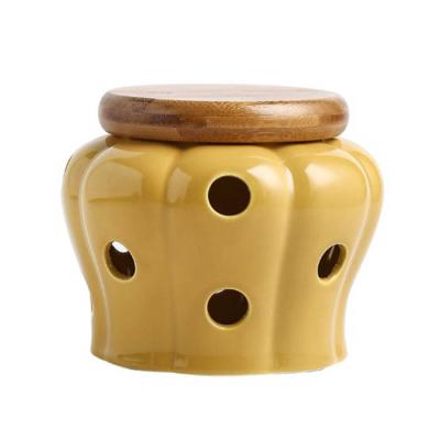 China Freshness Preservation Keep Fresh Ceramic Garlic Holder Storage or Garlic Keeper with Wooden Lid  for Kitchen for sale