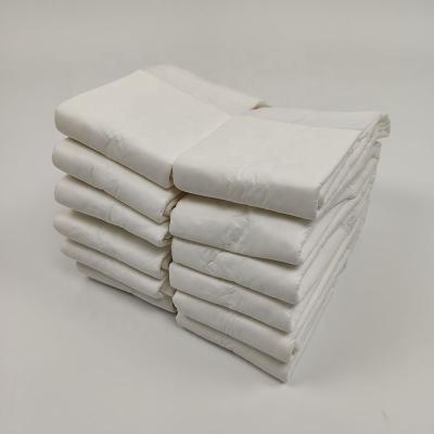 China Disposable Type Adult Diaper Insert Plain Weave Absorption Inner Diaper Pad for sale