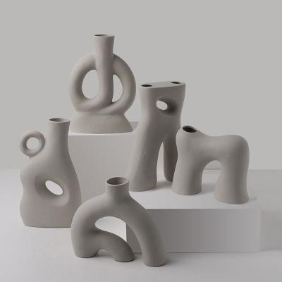 China Can Hold Water Odd Shapes Matte Ceramic Flower Different Hot Sale Vases Can Hold Water Collectibles Modern Home Table Decor Decorative Vase for sale