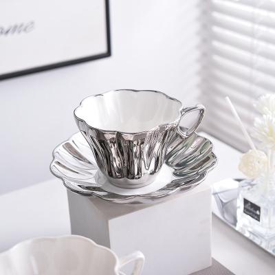 China Unique New Design Luxury Pearl White Silver Ceramic Cup And Saucer Viable For Coffee Tea Cup Unique Saucer Set Home Party Tableware for sale