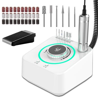 China Excellent Heat Dissipation 40000RPM Stainless Steel Electric Nail Drill Machine Professional Manicure With 6 Bits 36 Sanding Band for sale