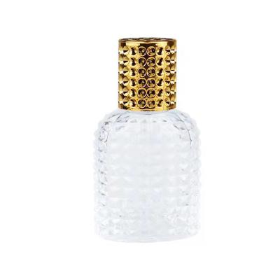 China Cosmetic Manufacturer Custom Empty Luxury 30ml Pineapple Shaped Mouth Spray Glass Spiral Perfume Bottle With Gold Lid for sale