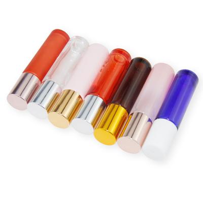 China Cosmetic Cosmetics Empty Packing10ml Brown Red Pink Blue Ball Bearing Transparent Glass Bottle With Gold And Silver Lid for sale