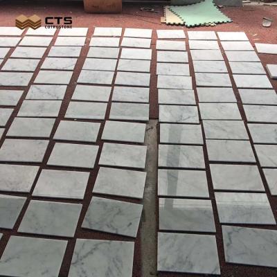 China Modern Wholesale Price 20x20 60x60 Meter Chinese Carrara White Marble for sale